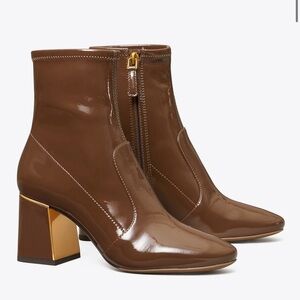 GIGI (Tory Burch) Patent Chocolate Leather Heeled Boots with gold details